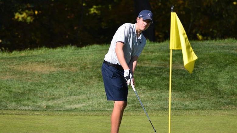 Jack DiTrani playing golf