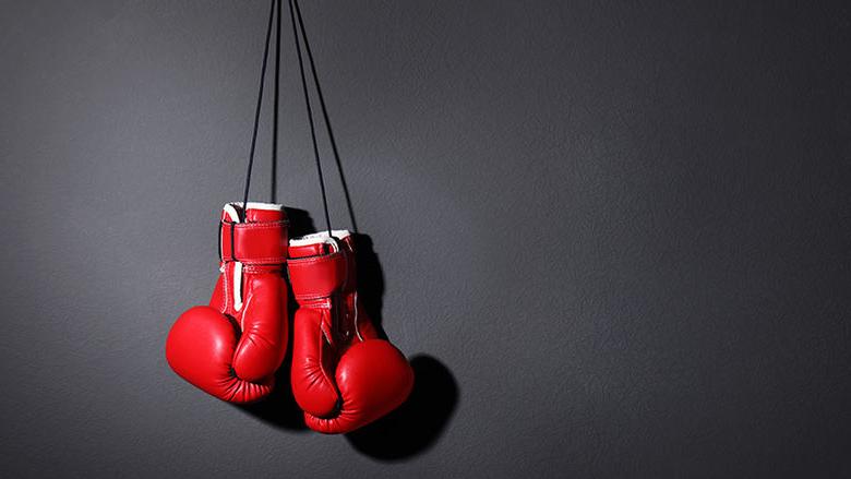 Boxing gloves hanging on a wall